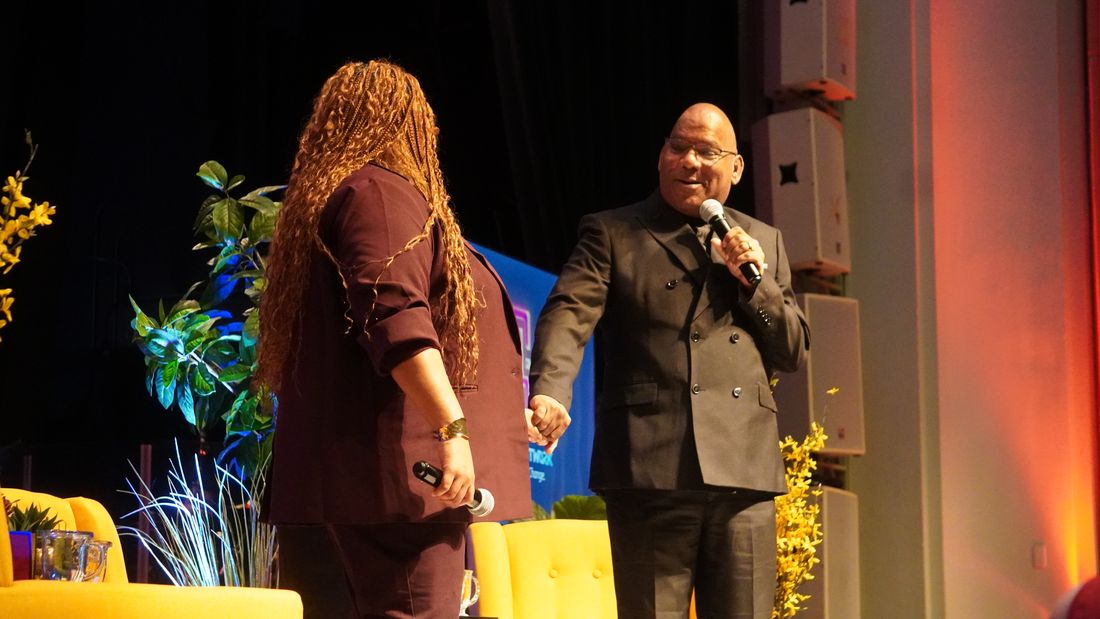 Apostle Stanford on stage with Dr. Gaylena Lawrence
