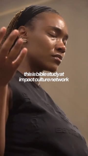 A worshiper with eyes closed during Bible study